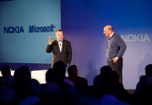 Stephen Elop from Nokia and Steve Ballmer from Microsoft on stage in London